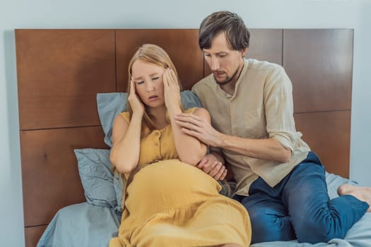 Expectant woman feels unwell, husband comforts and reassures her during a challenging pregnancy.