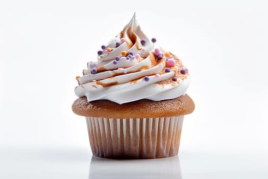 A delectable caramel drizzled cupcake with creamy frosting.