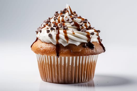 A delectable caramel drizzled cupcake with creamy frosting.