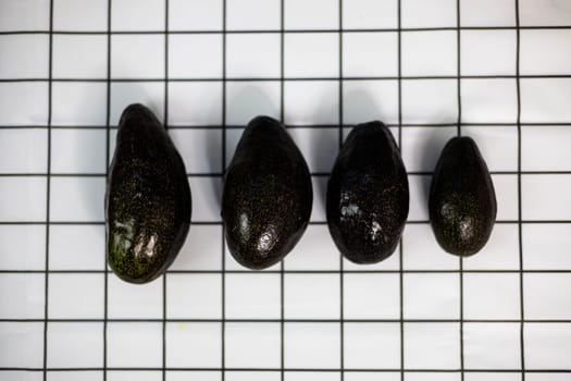 Ripe brown avocados placed together. Top view.