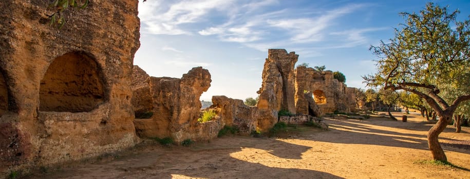 The historical walls with archs around the complex of Valley of the Temples