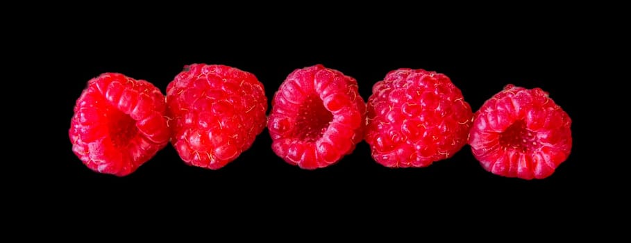 set of raspberry in line, isolated on black background. 