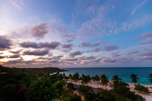 Tropical sunset on the beach. Guardalavaca, Cuba