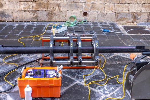 Butt fusion welding machine pipe welding machine for connecting water pipe together during a new building water supplies project. 