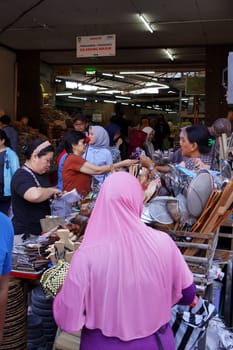 February 8, 2024. Solo, Central Java, Indonesia. The atmosphere of Pasar Gede, Solo, Central Java, just before the Lunar New Year. It is crowded with buyers and sellers inside the market.