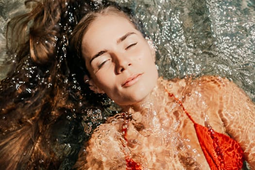 Happy woman sea relaxing floating in transparent sea water on summer holiday. Travel leisure recreation lifestyle, female in nature