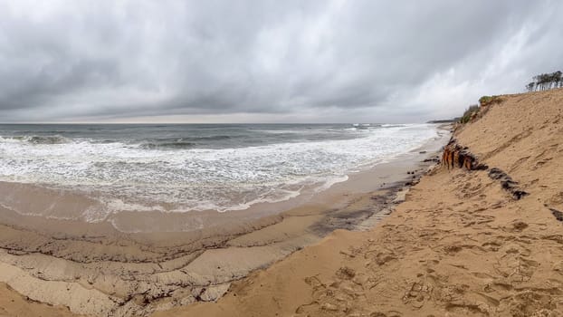 Ovar, Portugal - February 11, 2024: Storm Karlota worsens the fragile dune protection on Maceda's beach.