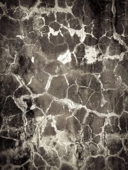 Grey cracked concrete wall texture. Abstract background of crack concrete wall.