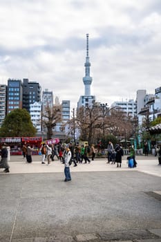 Tokyo, Japan, January 2024. view of the Tokyo skytree tower on the background of a downtown street