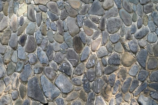 old wall made of real stone in the sun 1