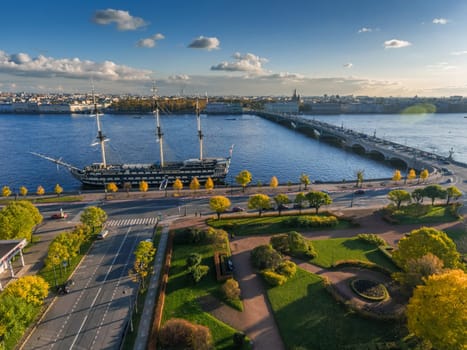 Aerial view of Troitsky Bridge, square, chapel, Solovki stone, crossroad kamenoostrovsky avenue and street of Kuibyshev at sunset, Golden autumn, panorama. High quality photo