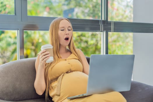 Tired pregnant woman at work drinks coffee. caution advised due to potential harm of caffeine during pregnancy.