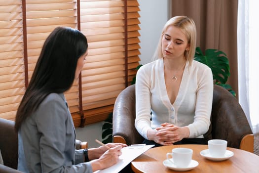Psychological consultation on mental health or seeking help from professional, young patient on therapy session while psychiatrist making diagnostic on mental illness. Mental treatment session. Blithe