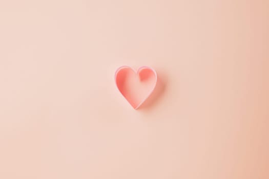 Happy Valentines Day. Above pink ribbon heart shaped decorative symbol isolated on pastel pink background, love romance concept, template banner design with copy space, Mother, Woman day