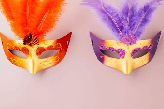 Happy Purim carnival. Carnival mask for Mardi Gras celebration isolated on purple background banner design with copy space, jewish holiday, Purim in Hebrew holiday carnival ball, Venetian mask