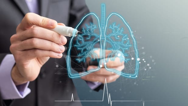 Tablet,Medical technology and futuristic concept.Digital healthcare and network on modern virtual screen, Lung, body Health Check with digital system support for patient with medical icon at hospital. High quality photo