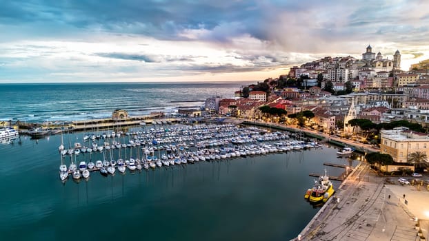 Drone footage of a landscape captured at sunset over Porto Maurizio ligurian City