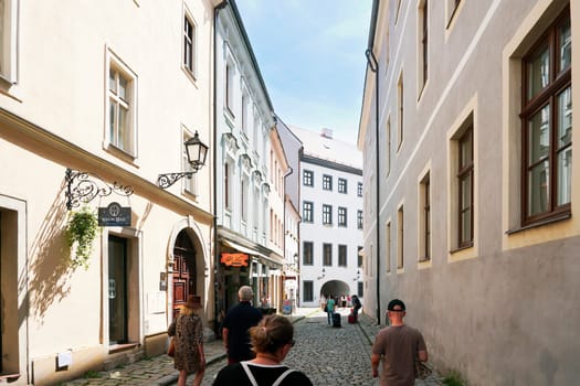 Bratislava, Slovakia, August 25, 2023: Tourists on Klariska street in the old town on a sunny summer day