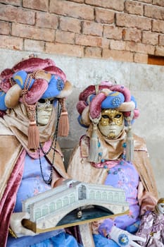 VENICE, ITALY - Febrary 7 2023: The masks of the Venice carnival 2024