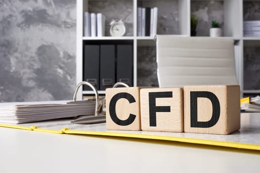 CFD contract for difference. Open yellow folder with documents and cubes