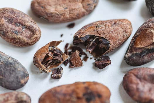 Closeup cocoa roasted beans. Shallow dof.