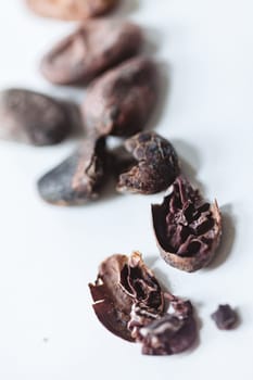Closeup cocoa roasted beans. Shallow dof.