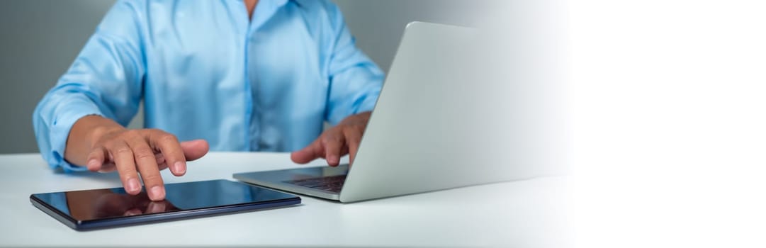 Businessman using tablet to login represents protection concept of cyber security and data security including secure login.