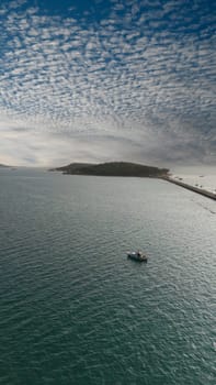 Drone footage at Urla Izmir Province, Turkey. Known as Quarantine Island. During the 19th century the island was equipped with the up to date medical instruments and it was used as a quarantine island. High quality photo