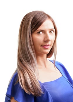 Young woman with long hair, in blue dress, studio portrait from shoulders up