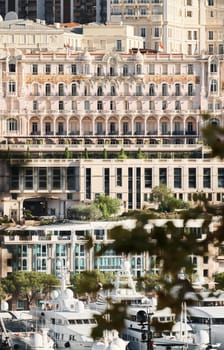 Monaco, Monte Carlo, 01 October 2022 - facades of famous buildings at the famous motorboat exhibition at morning, mega yacht show, novelties of the boating industry. High quality photo