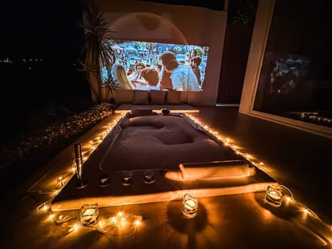 Night jacuzzi bathtub with movie projection in Doi Chang in Chiang Rai, Thailand, south east asia