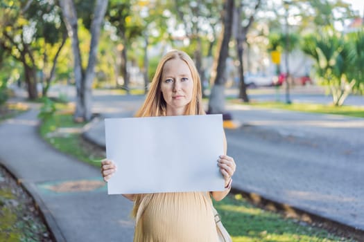 pregnant woman takes a stand for the rights of pregnant women, engaging in a solo picket to advocate for awareness, support, and the empowerment of expectant mothers.