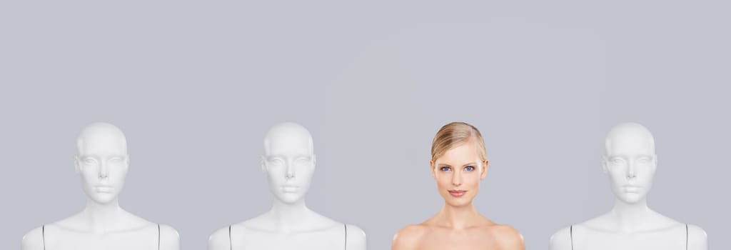 Woman, face and beauty with mannequin and unique for skincare, wellness and portrait on white background. Banner, natural cosmetics and dermatology with individuality, robot or dummy in studio.