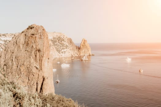 Aerial panoramic view of beautiful sunset above sea. Beautiful seascape. Sun glare, small waves on the water surface. Evening. Horizon. Nobody. No people. Copy space. Never-ending beauty of nature