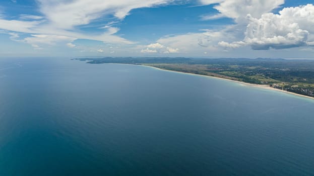 Coast of Borneo island with sandy beach. Borneo, Malaysia.