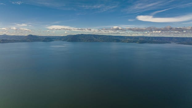 Aerial view of lake Toba is located in the crater of a volcano and mountains. Sumatra, Indonesia.