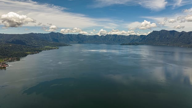 Aerial drone of Lake in the mountains of Sumatra among the mountains. Indonesia.