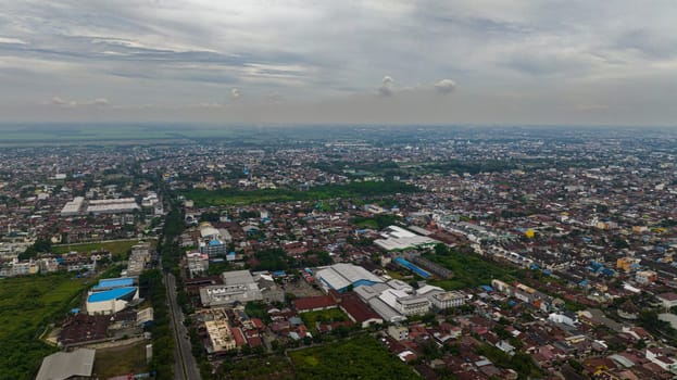 Aerial drone of Medan is the capital and largest city of the Indonesian province of North Sumatra, Indonesia.