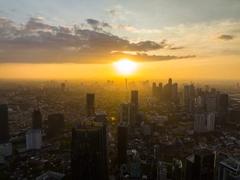 Jakarta city and skyscrapers at sunset. Urban landscape. Indonesia.