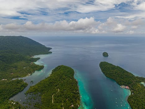 Coast of Weh island with rainforest and jungle view from above. Aceh, Indonesia.