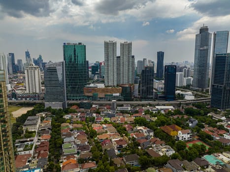 Aerial view of Jakarta business district in Indonesia capital city with many modern skyscrapers. Indonesia.