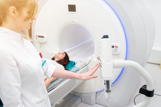 Medical CT or MRI Scan in the modern hospital laboratory. Interior of radiography department. Technologically advanced equipment in white room. Magnetic resonance diagnostics machine.