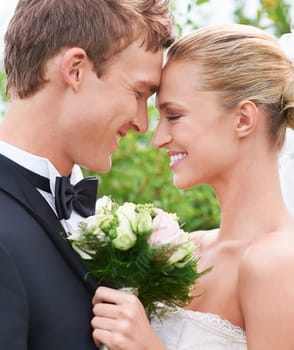 Couple, man and woman in closeup on wedding in love, happiness and affection in relationship with romance and joy. Newlyweds, groom and bride in ceremony with flower, excited and beautiful