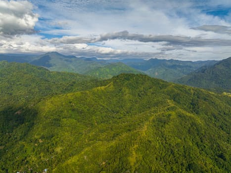 Aerial view of mountain range and mountain slopes with rainforest. Sumatra, Indonesia.