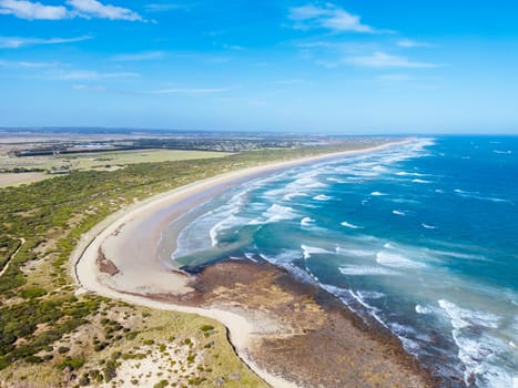 The idyllic Thirteenth Beach near Barwon Heads from Breamlea on a hot summer's day in Victoria, Australia