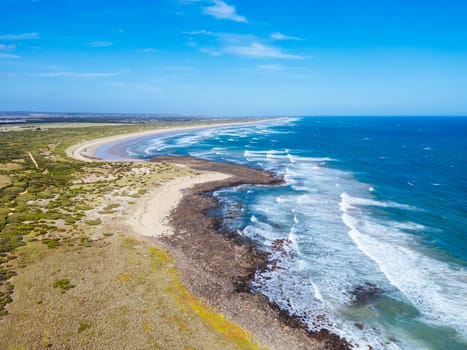 The idyllic Thirteenth Beach near Barwon Heads from Breamlea on a hot summer's day in Victoria, Australia