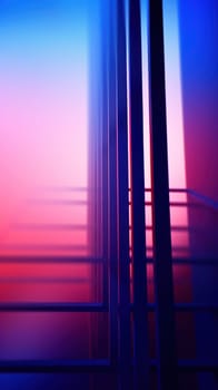 A blurry picture of a metal railing with some red and blue in it