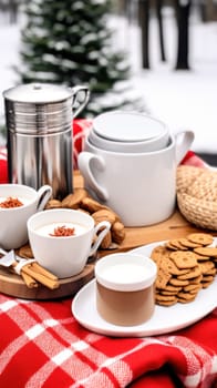 A table topped with plates of food and cups of coffee