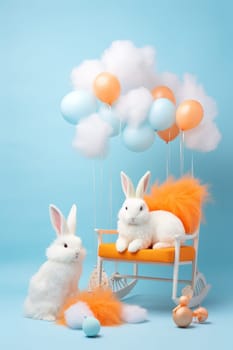 Two bunnies are sitting on a rocking chair