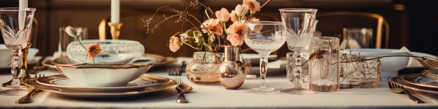 A table set for a formal dinner with champagne glasses and plates